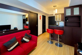 Elegant and and Spacious 1BR The Wave Kuningan Apartment By Travelio